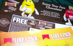 2 $1 off a pack of Marlboro cigarettes coupons and a Free Mars candy coupon