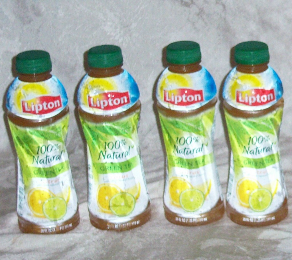 4 Lipton 100 natural citrus green Tea bottles